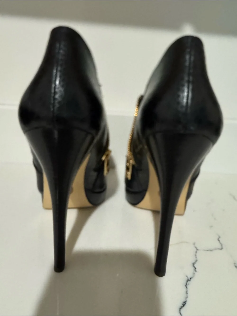 Michael Kors Size 9  High Heel Ankle Booties with Gold Zip